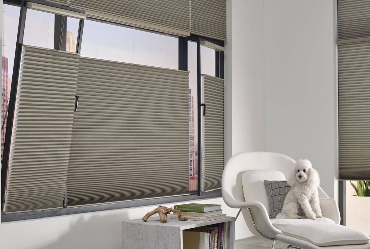 When selecting a window treatment to increase privacy at night, consider cellular shades that have a higher opacity to prevent visibility from the outside.