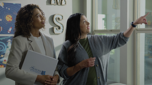 Two people looking at blinds