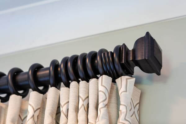 Curtain rings attach the fabric to the curtain rod and allow the treatment to slide open or closed. Curtain rings attach the fabric to the curtain rod and allow the treatment to slide open or closed.