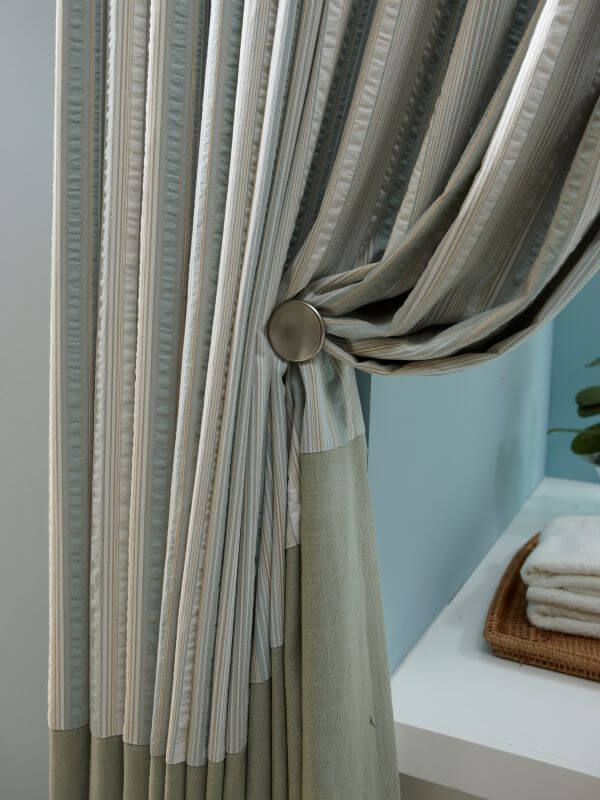 Tie-backs are accessories used to hold back the sides of the curtain or drape in an open position. 