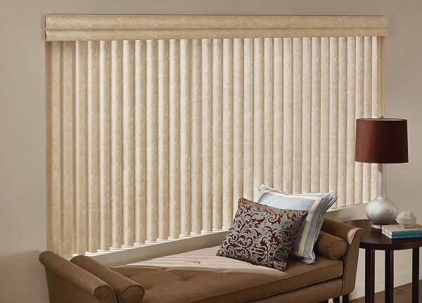 Vertical blinds are hard window treatments that use vertical vanes to cover the window. 