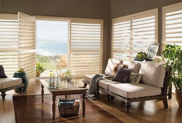 Large patio doors can be used to open up the divide between the inside and outside. Be sure any window treatments for these patio doors do not create an obstacle. Large patio doors can be used to open up the divide between the inside and outside. Be sure any window treatments for these patio doors do not create an obstacle.