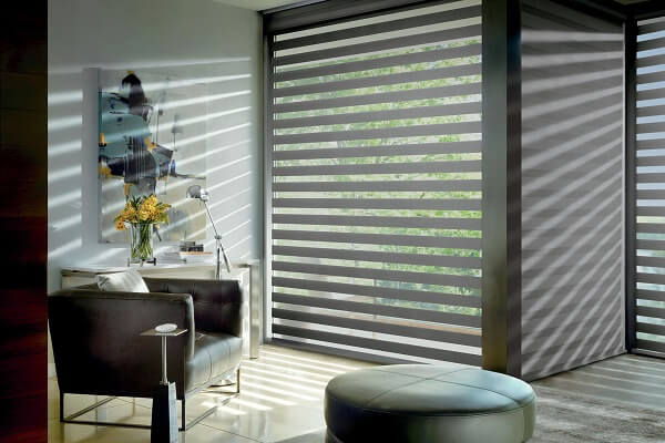 Motorization and smart home connection options are available on a wide range of window treatment options providing added convenience, efficiency, and aesthetics. Motorization and smart home connection options are available on a wide range of window treatment options providing added convenience, efficiency, and aesthetics.
