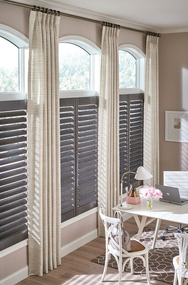 When layering window treatments, try to pair hard window treatments, like shutters and blinds, with soft window treatments. When layering window treatments, try to pair hard window treatments, like shutters and blinds, with soft window treatments.