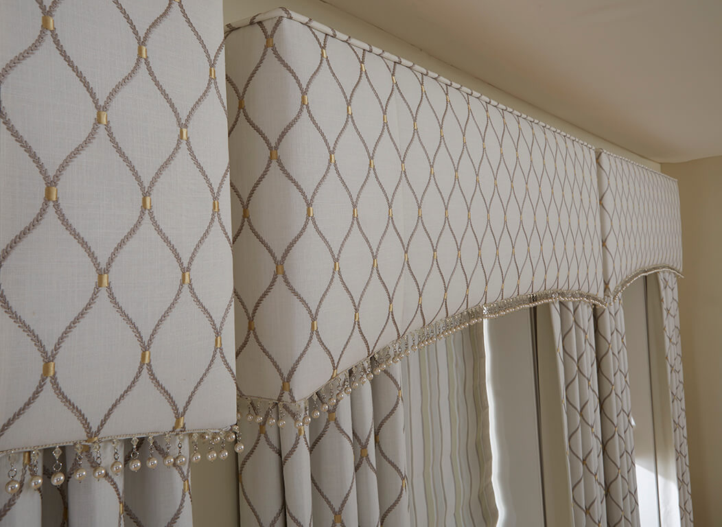 Top treatments for window treatments like cornices and valances add style and flair while disguising the hardware.