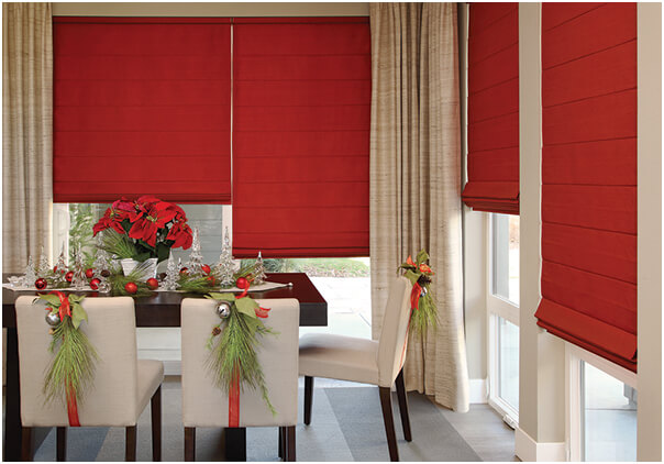 Red Roman shade blinds and Christmas holiday table