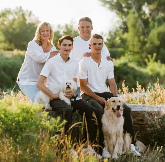 Susan with her husband, 2 sons & 2 dogs